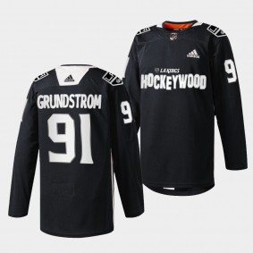 Los Angeles Kings 2022 Hockey Wood Carl Grundstrom #91 Black Jersey Warm-Up